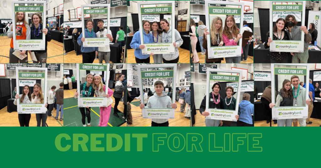 Groups of individuals holding up a 'Credit For Life' picture frame around themselves