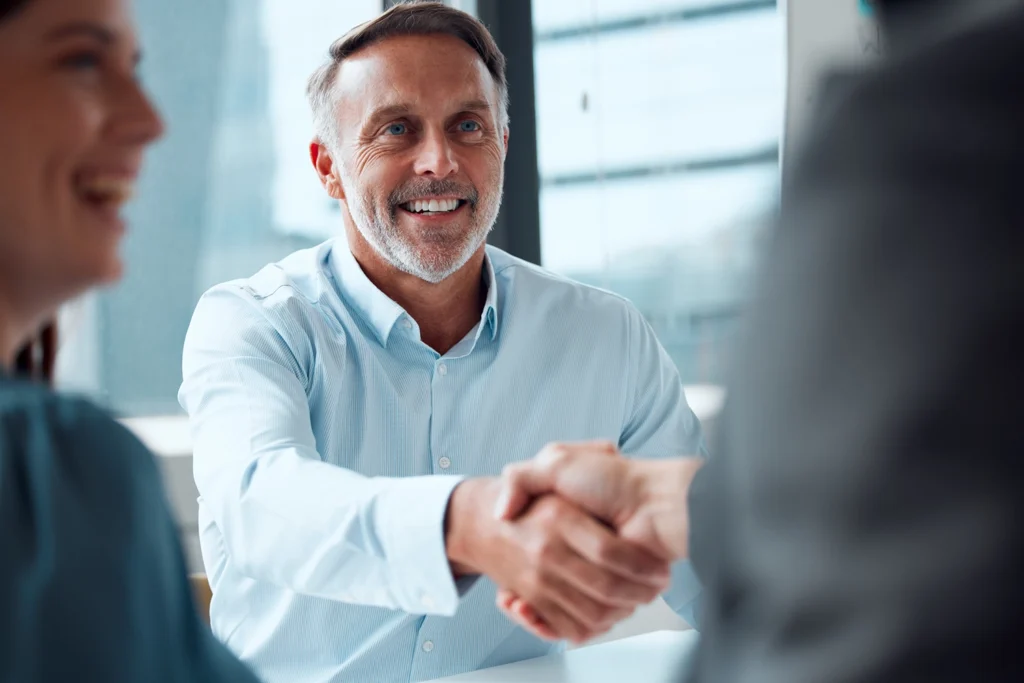 Country-Bank-man-shaking-hands-in-business-deal