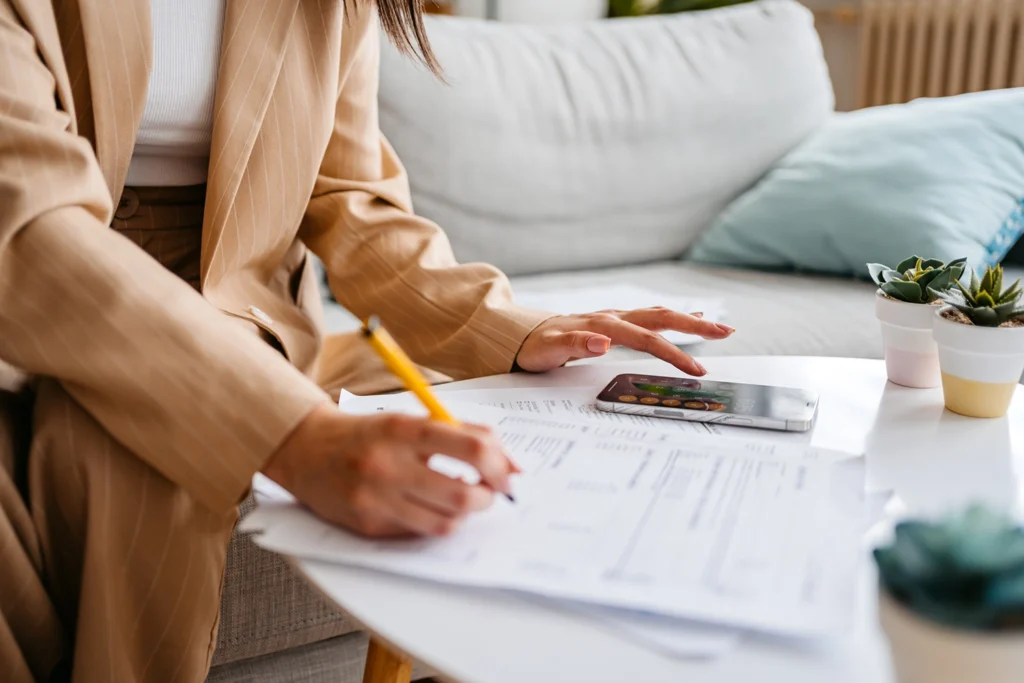 Country-Bank-person-filling-out-paperwork-for-a-business-loan