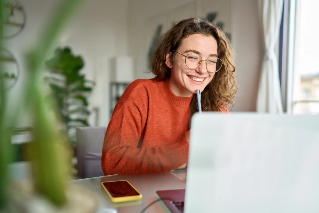 Country-Bank-senior-woman-in-bamboo-swing-chair-opening-checking-account-online